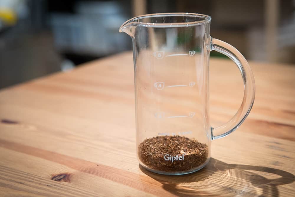 How to make French Press Coffee - Step 2: Add your coffee - CoffeeHow.co