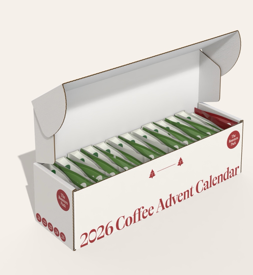 The Roasters Pack 2026 Coffee Advent Calendar, a long white box open to show a row of green coffee pouches