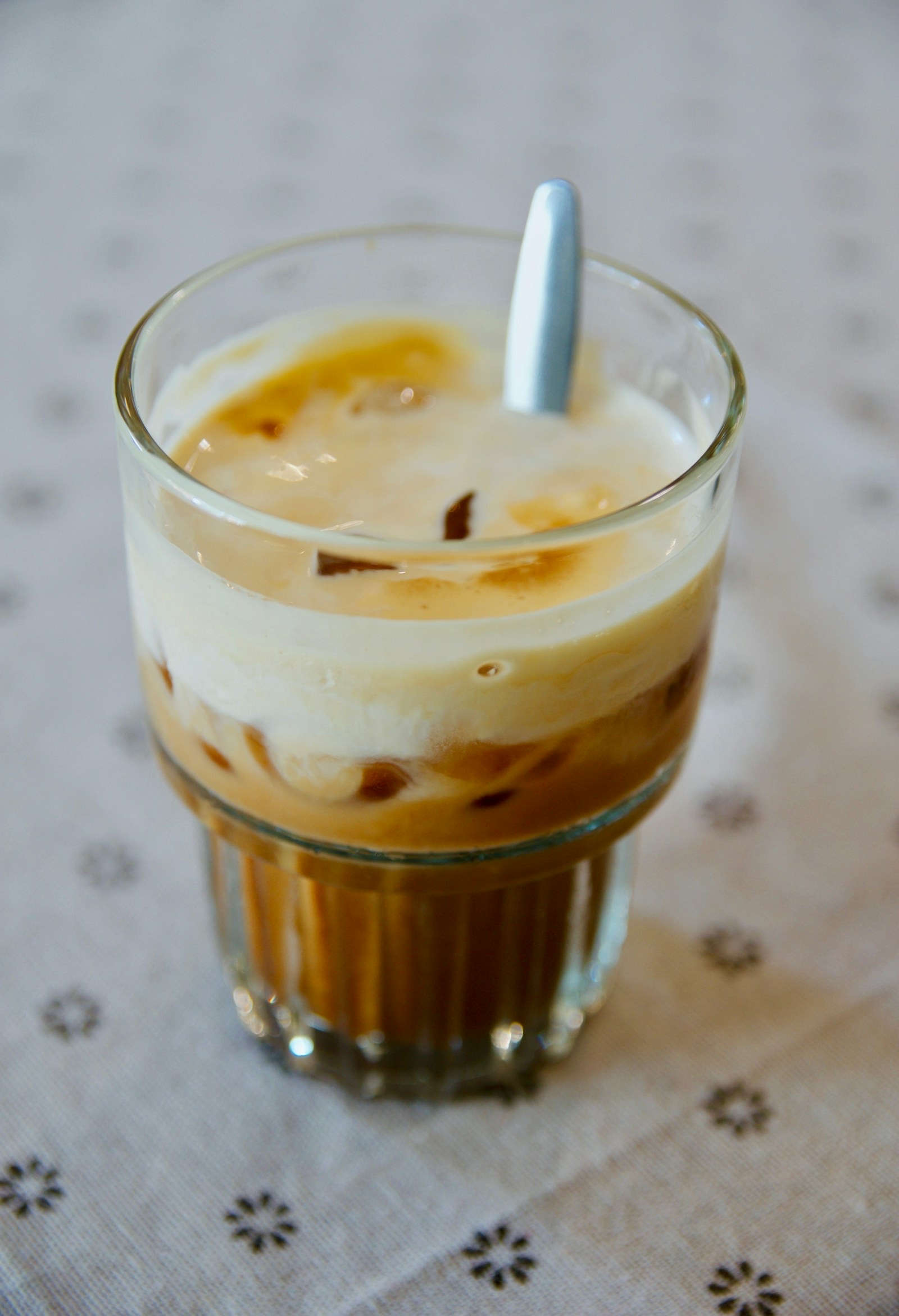 Vietnamese iced egg coffee (cà phê trứng) topped with whipped egg cream